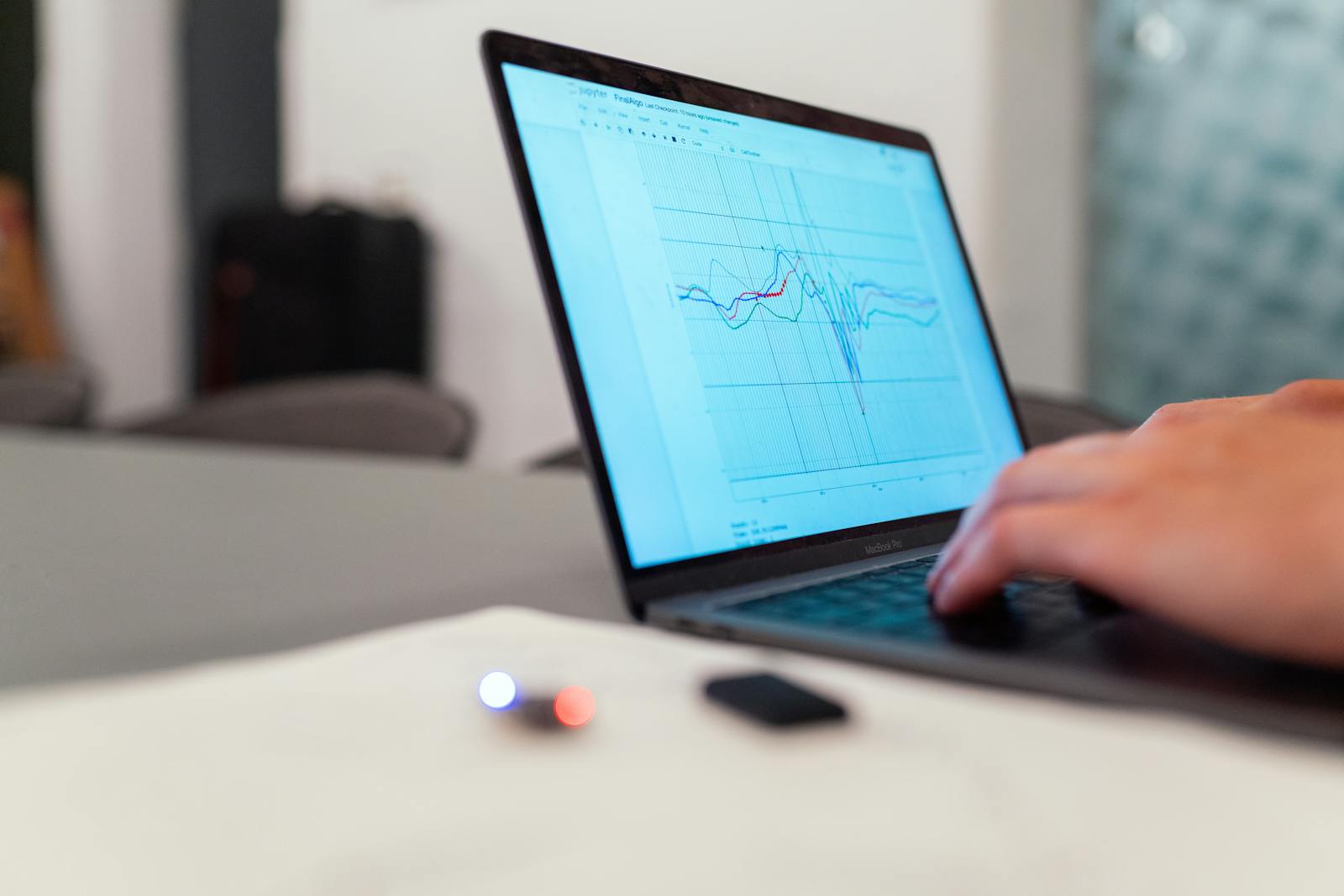 Laptop displaying an analytics chart of business data
